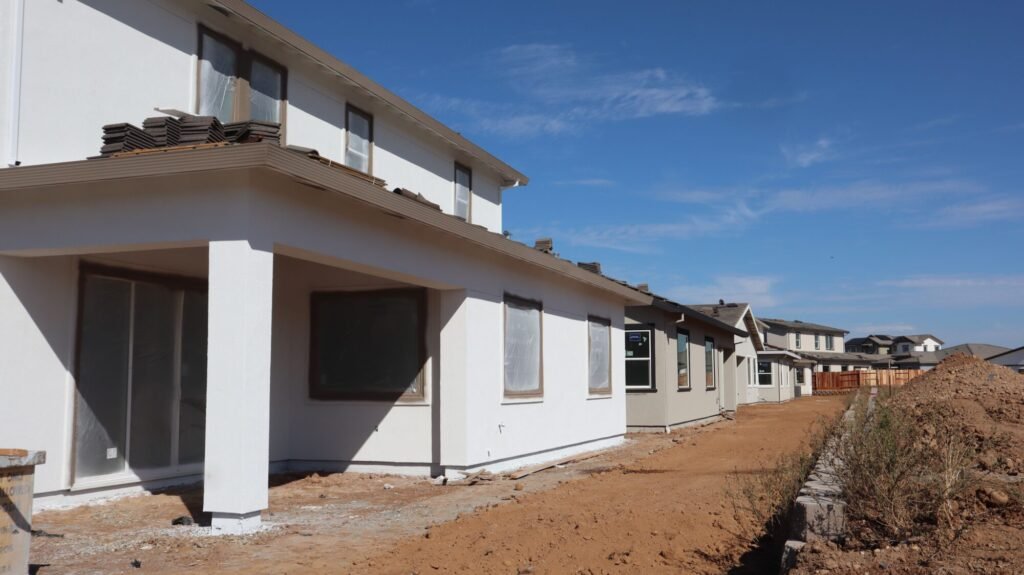 Modern suburban residential houses under construction, promising new living space.